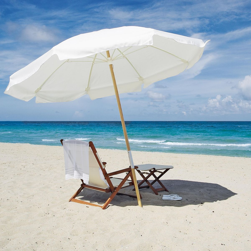 Beach chairs beneath a parasol