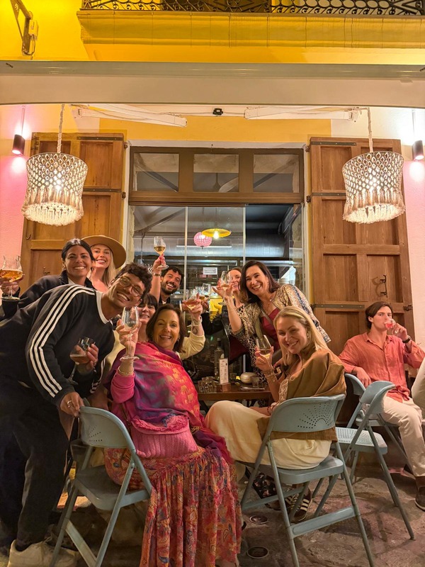 TWC members celebrating together at a team dinner